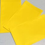 Kadozakje, Medium 12cmx19cm , Effen fel geel ( per stuk )