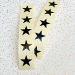 Stickertjes , ster 15mm , zwart ( per 10 stuks )