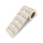 Sticker ovaal 30mm x 80mm , champagne met wit `Lovely x-mas` ( per 10 stuks )